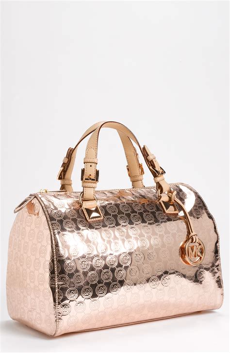 michael kors rose gold satchel.